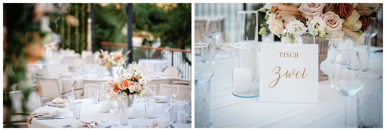 Tisch Nummerierung in weiß Gold mit weißer Tischdekoration und orange weiß und creme weißer Blumenstrauß bei einer Hochzeit in Kroatien